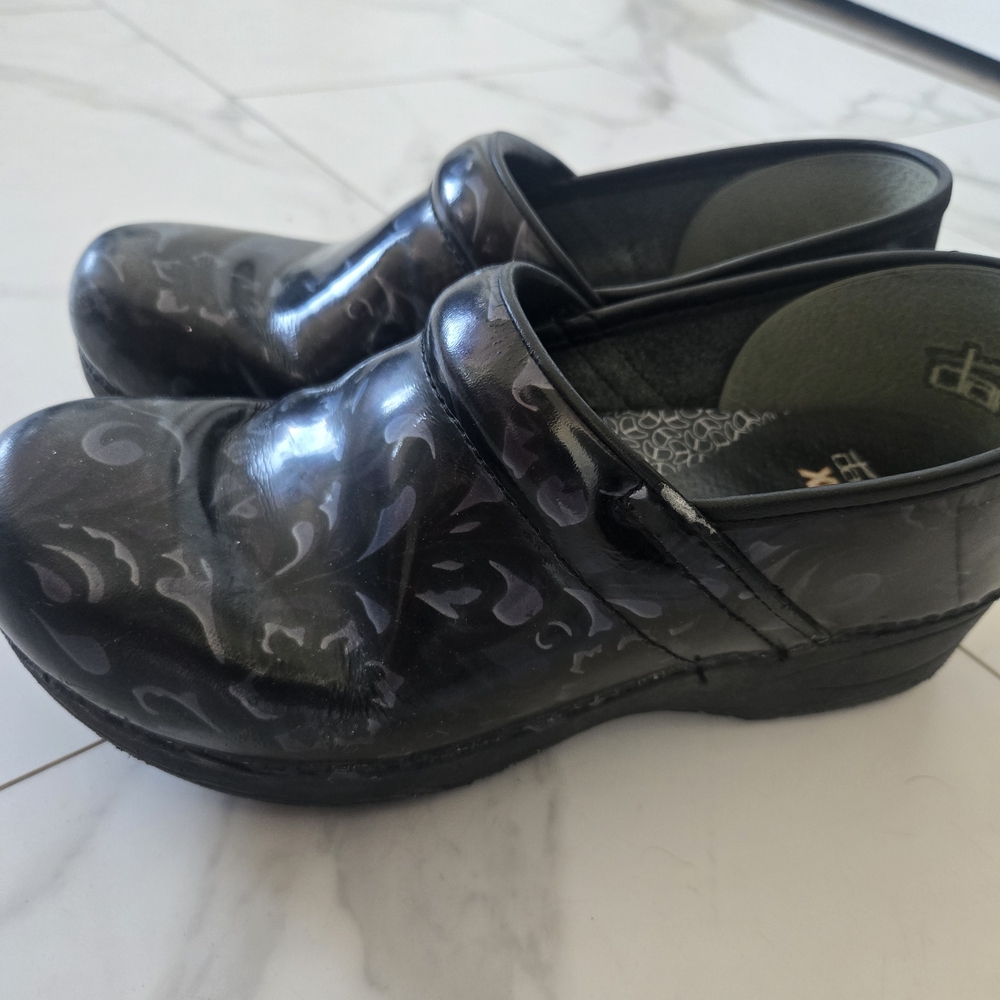 Dansko Black Patterned clogs